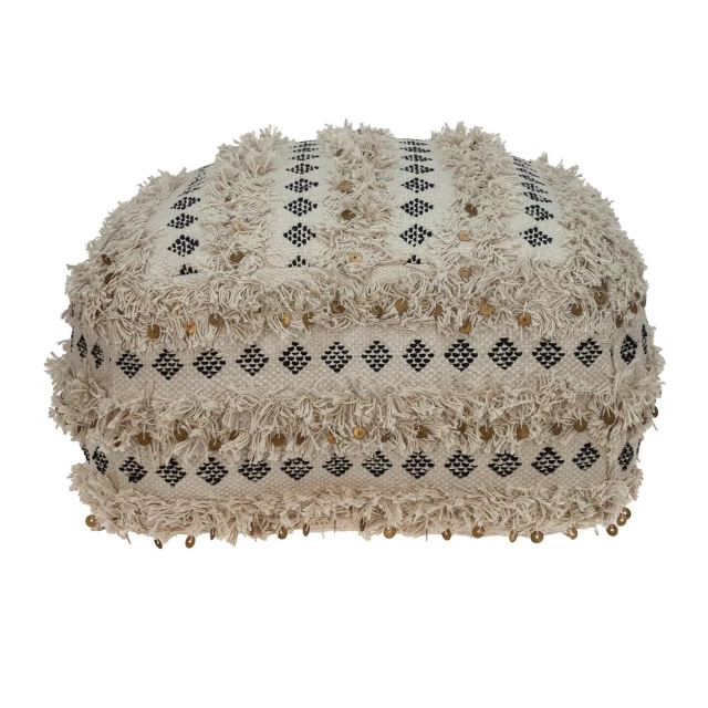 Beige cotton blend abstract pouf ottoman with woolen pattern in a home setting