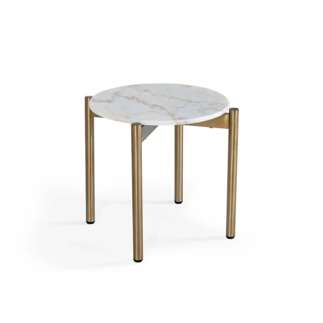 Gold white marble round end table with wood chairs in an outdoor setting