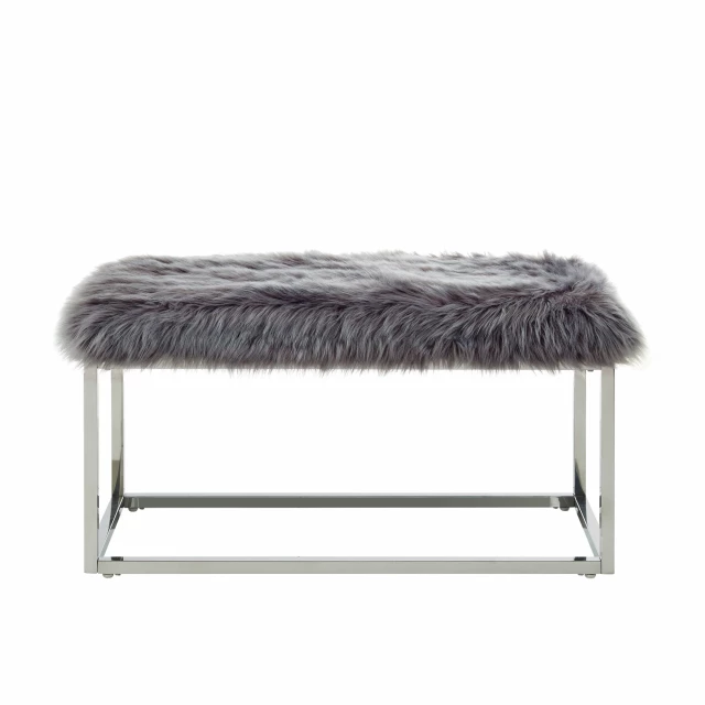 Gray silver upholstered faux fur bench with hardwood flooring