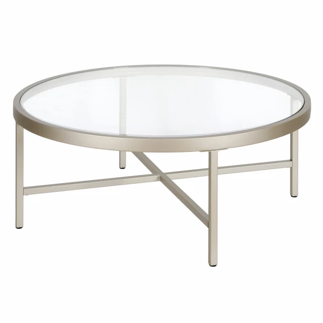 Silver glass steel round coffee table with natural and composite materials in furniture design