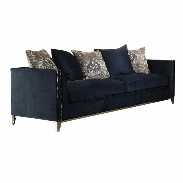 Velvet black sofa with five toss pillows and comfortable studio couch design