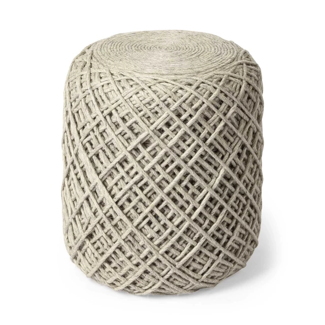 Oatmeal wool cylindrical pouf with diamond pattern and natural beige material