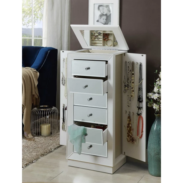 White mirrored nightstand with wood dresser and plant decoration