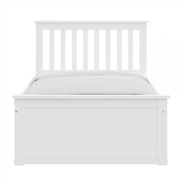 Solid wood twin bed with pull-out trundle perfect for space-saving bedroom furniture
