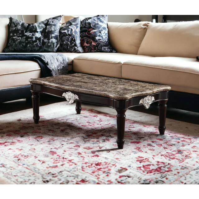 Marble solid manufactured wood coffee table with brown and black wood design in interior setting