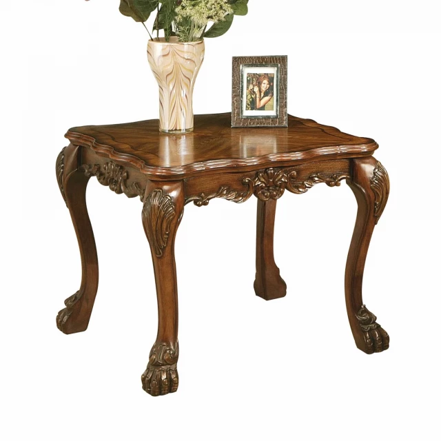 Brown solid wood mirrored end table with houseplant and flowerpot on top in a furniture setting