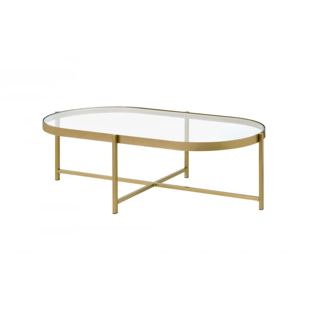 Gold clear glass oval coffee table with plywood accents in a modern furniture design
