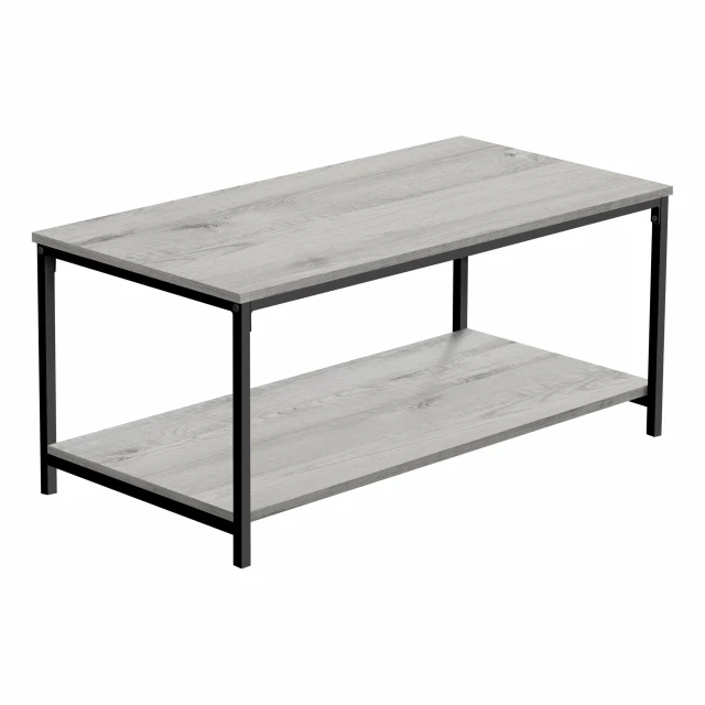 Grey black rectangular coffee table made of hardwood and plywood in outdoor setting