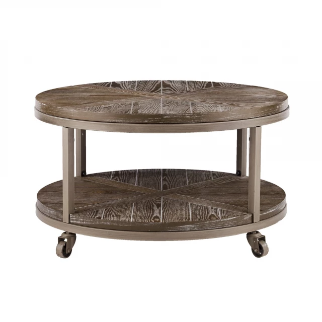 Distressed round tier rolling coffee table with natural metal elements