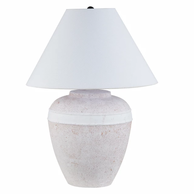 urn table lamp with white cone shade on wooden table