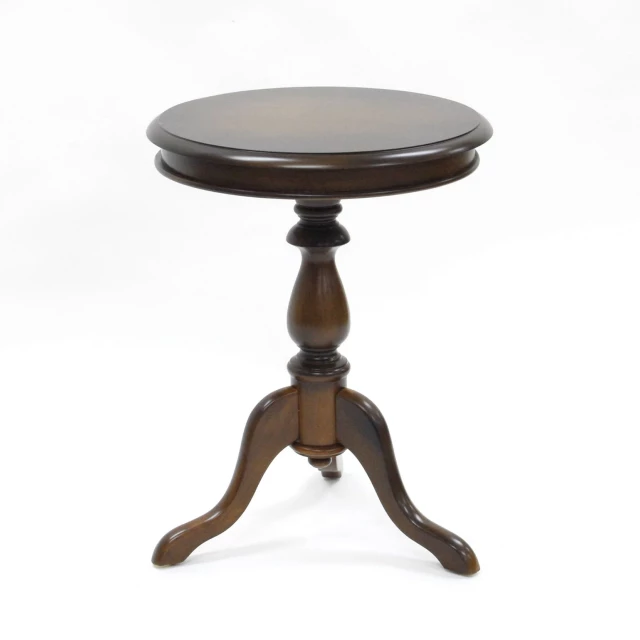 Brown manufactured wood round end table with hardwood and metal accents
