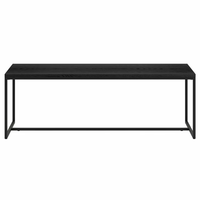 Black coffee table with rectangle shape and wood material in an outdoor setting