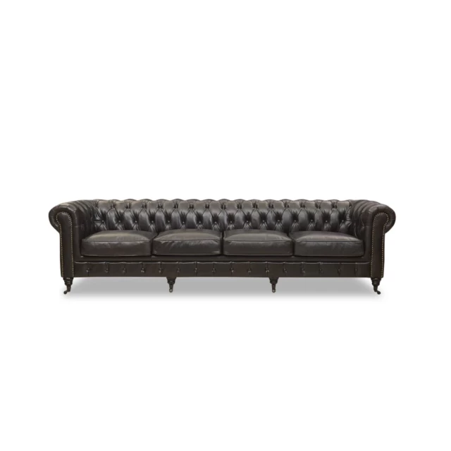 Black leather sofa with comfortable rectangle cushions and wooden frame