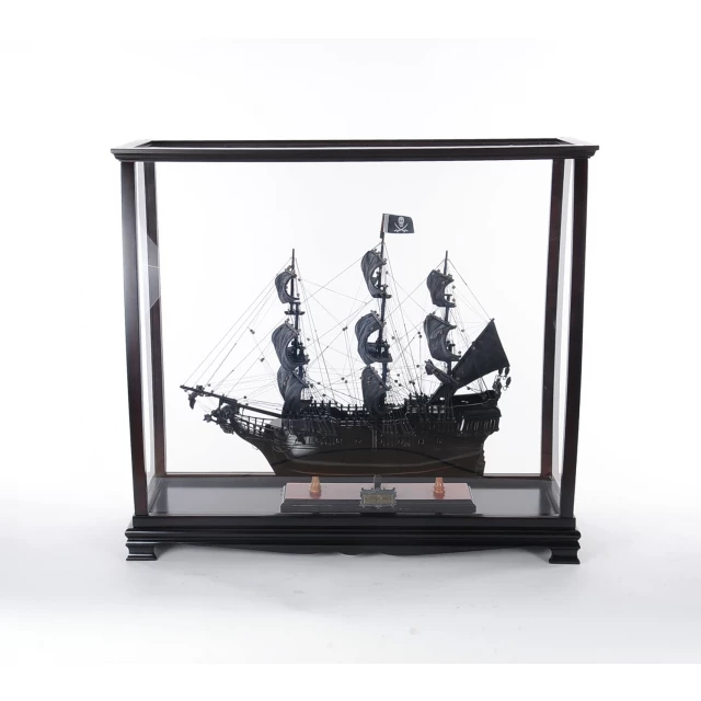 Black glass standard display stand with artful ship design