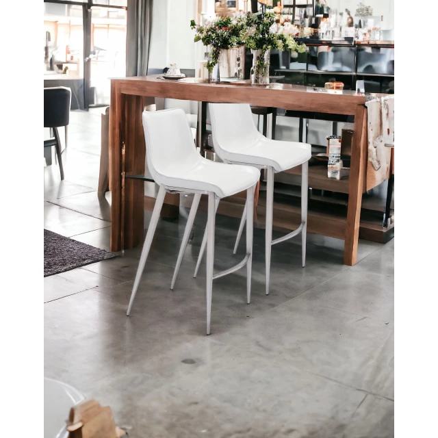 Low back bar height chairs in wood with grey interior design elements