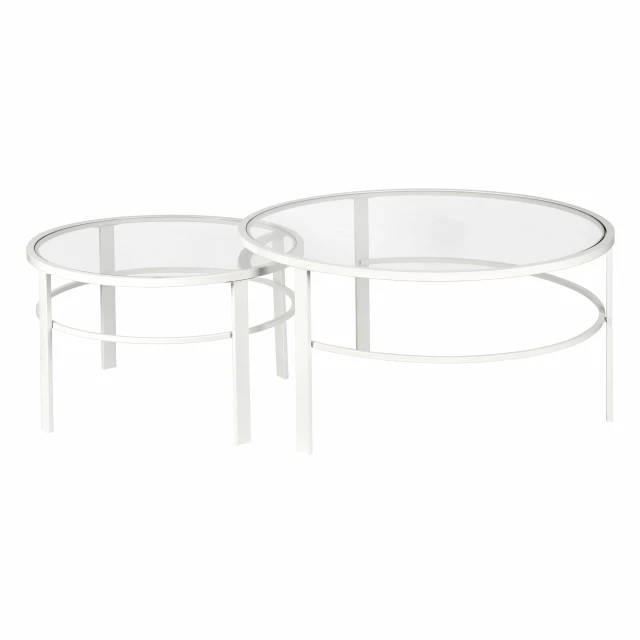 Set of glass and steel round nested coffee tables with transparent elements