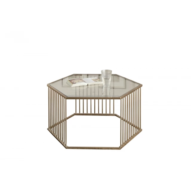 Clear glass and metal hexagon coffee table in a modern design