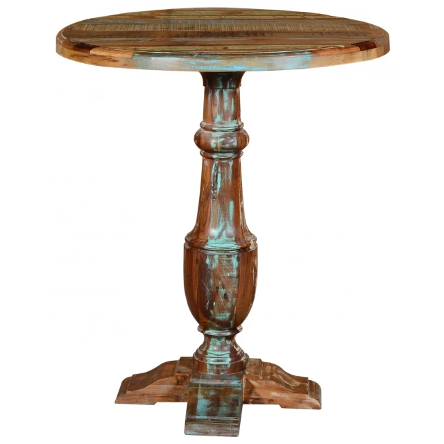 Distressed wood round pedestal high table with drinkware and serveware on top