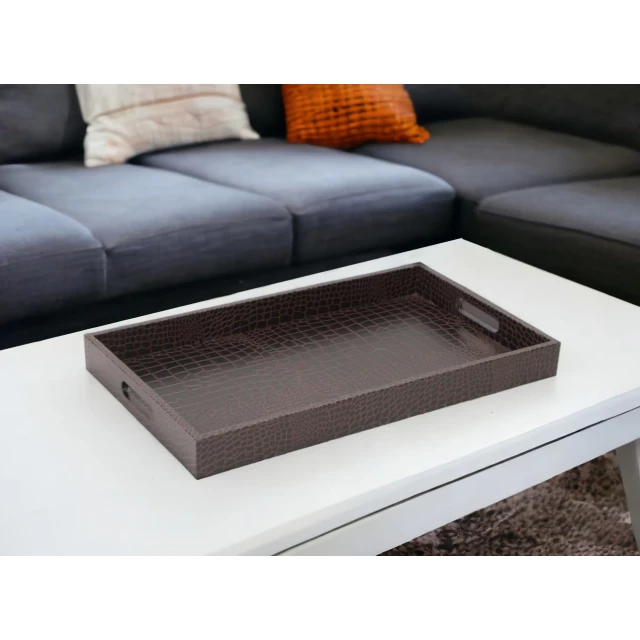 leather crocodile finish serving tray with handles on wooden table