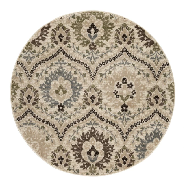round floral stain resistant area rug with beige pattern and symmetrical motif