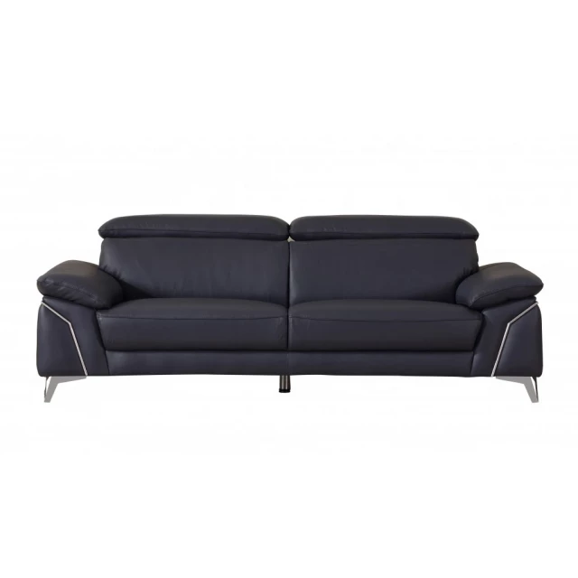 Blue silver Italian leather sofa with comfortable studio couch design in a modern furniture setting