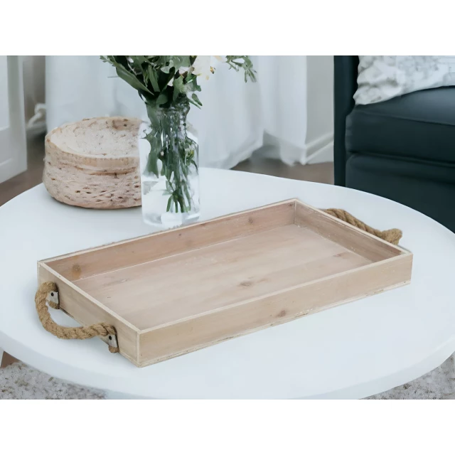 light gray wooden tray with rope handles for tableware and serveware