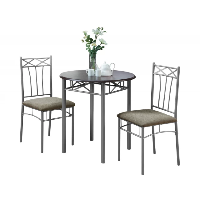 Cappuccino silver metal dining set with table chairs and plant decor