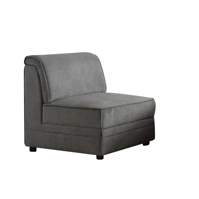 Gray black velvet slipper chair with hardwood armrests and comfortable cushioning