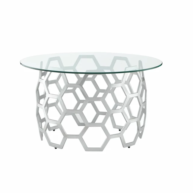 Silver glass iron round coffee table in a modern furniture setting