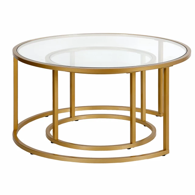Nested round and oval glass steel coffee tables in modern design