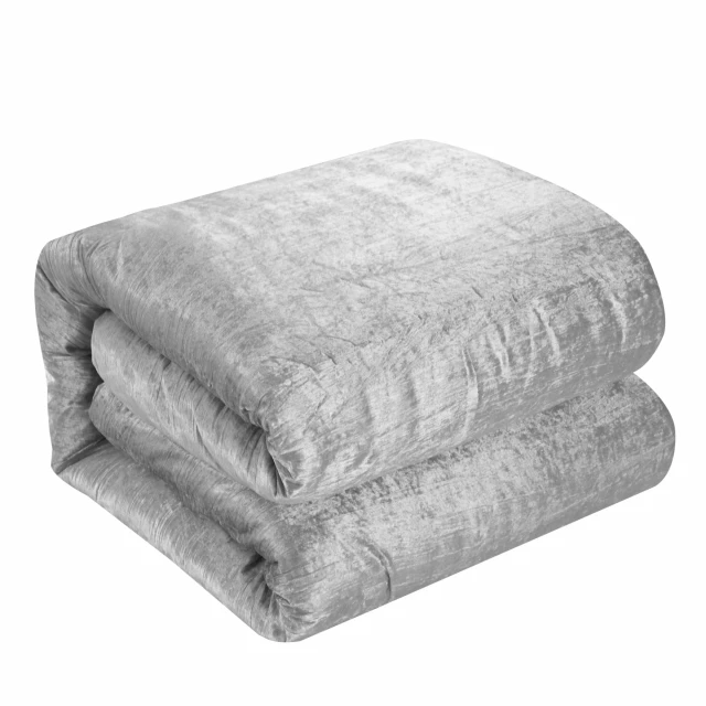 Polyester thread count washable down comforter with natural materials on grassy texture