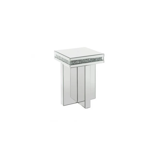 mirrored manufactured wood square end table in a setting with outdoor furniture elements