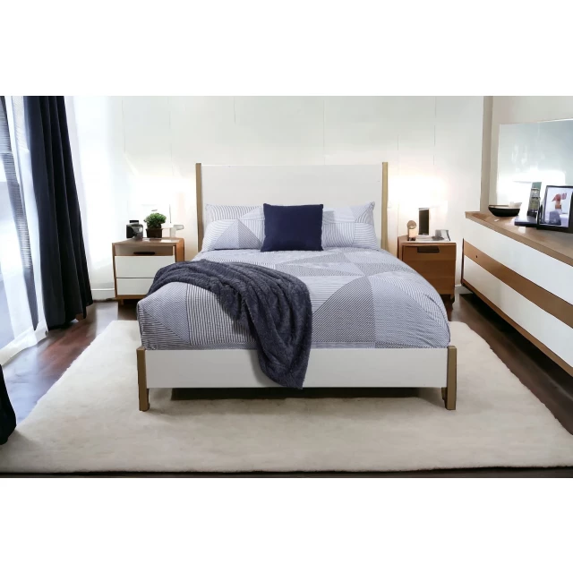 White solid manufactured wood queen size bed with elegant design details