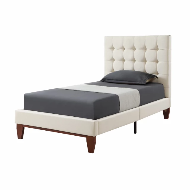 Wood twin tufted upholstered linen bed in a bedroom setting
