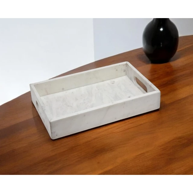 white rectangular marble serving tray with handles
