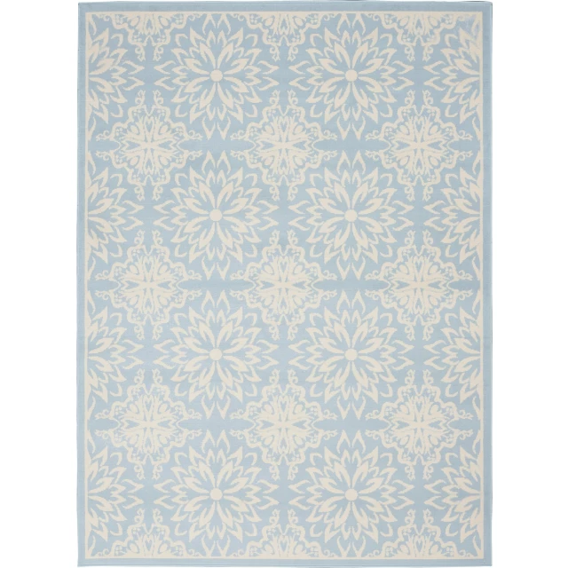 blue floral power loom area rug with purple aqua and electric blue symmetrical pattern