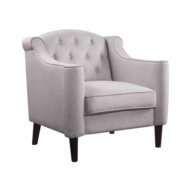 Cream fabric club chair with armrests for comfortable seating