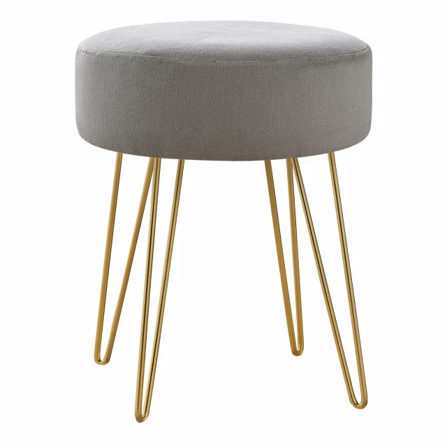 Gray velvet gold round ottoman with metallic and wood textures