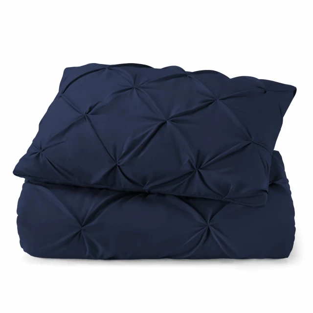 Electric blue washable down alternative comforter with soft linens and subtle logo design