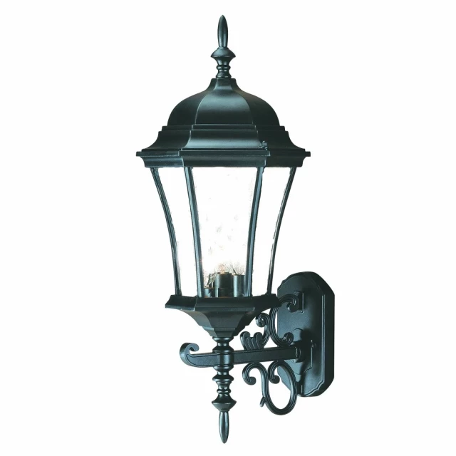 black ornamental carousel lantern wall light with metal finish and decorative finial