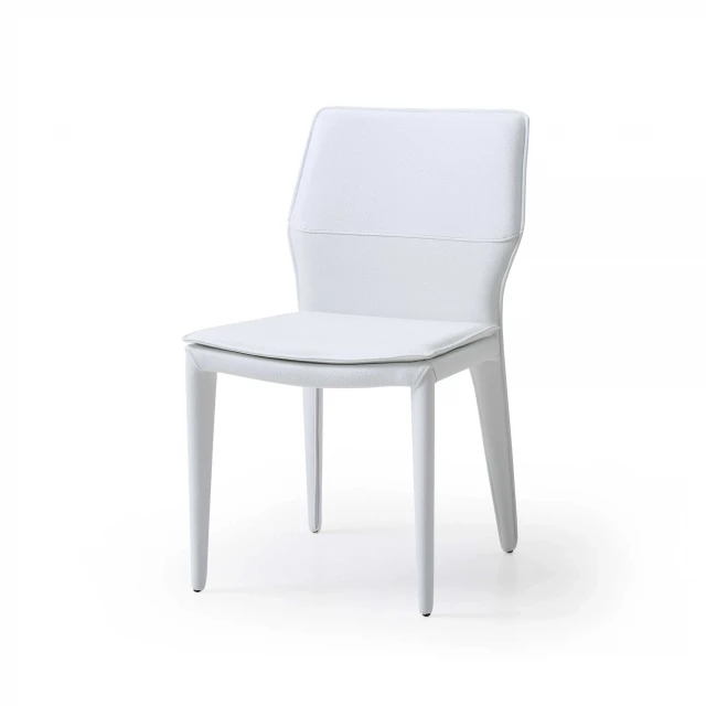 White faux leather dining chairs with wood table and comfortable seating