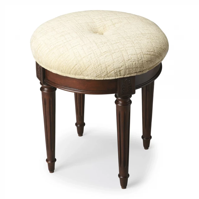 Off white linen dark brown ottoman with hardwood and natural plywood materials in outdoor setting