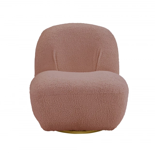 Pink Sherpa solid swivel slipper chair in a comfortable furniture setting
