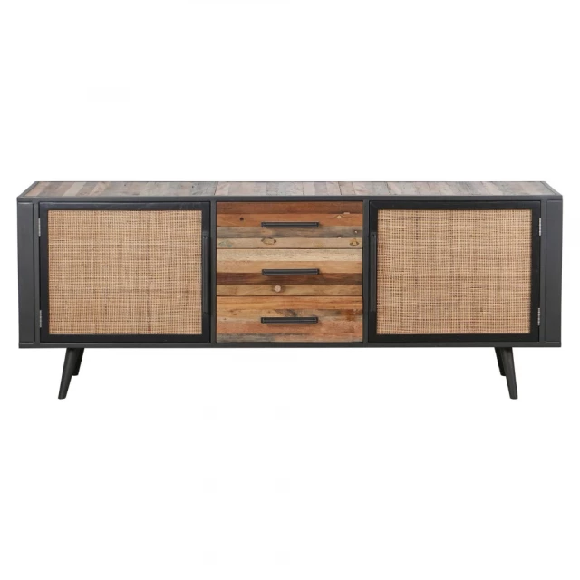 Rustic black natural rattan buffet server with wood drawers and cabinetry surrounded by plants
