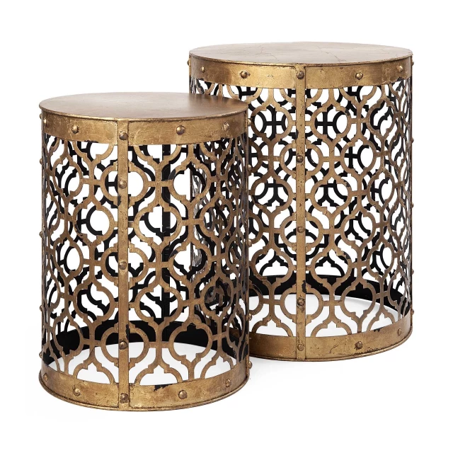Cylindrical gold metal accent tables in a home decor setting