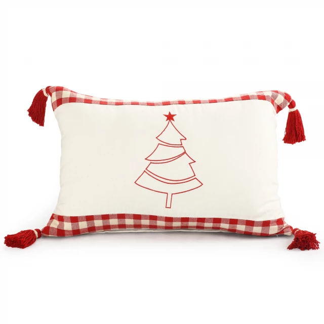 Christmas tree cotton zippered pillow with tassels on a couch textile background