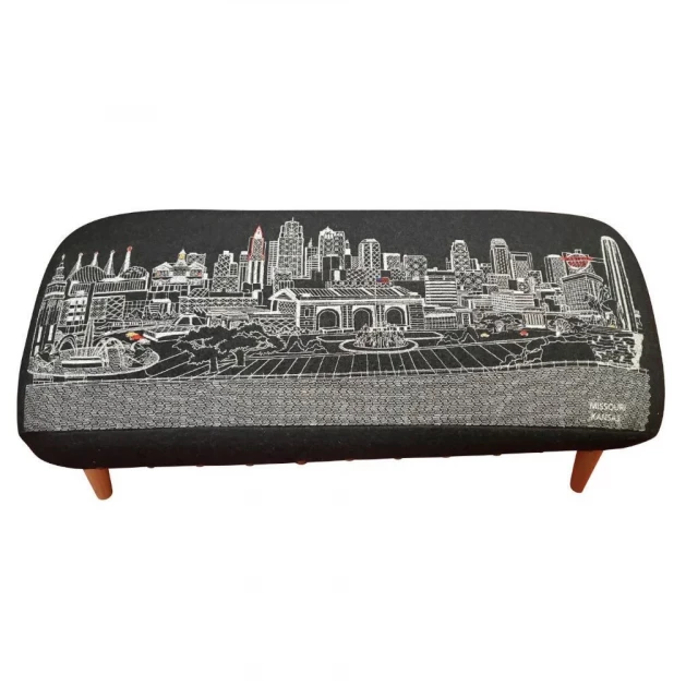 Black wool brown ottoman with metal accents and fashion accessory design elements