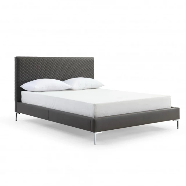 Grey upholstered faux leather bed frame in modern bedroom setting
