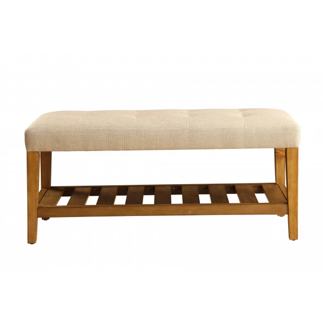 Beige brown upholstered polyester bench with shelves and wood details in a cozy outdoor setting
