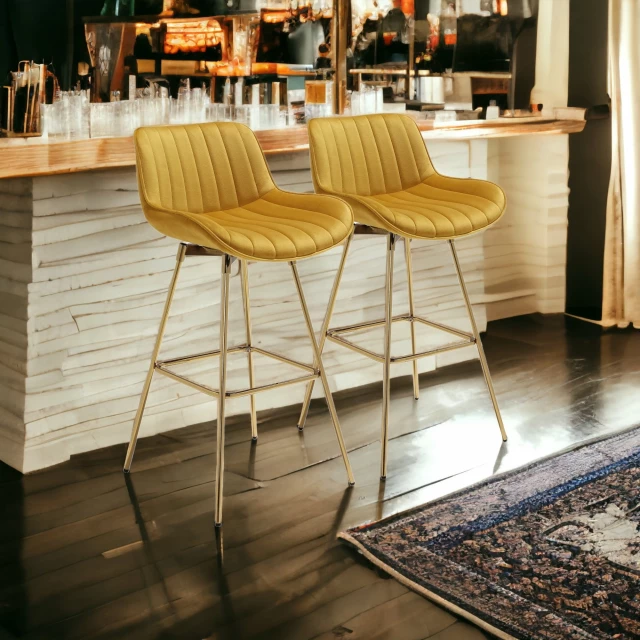 Low back bar height bar chairs in a stylish wood and interior design setting